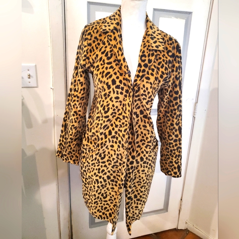 Faux leopard jacket . Size M . Fully lined in black